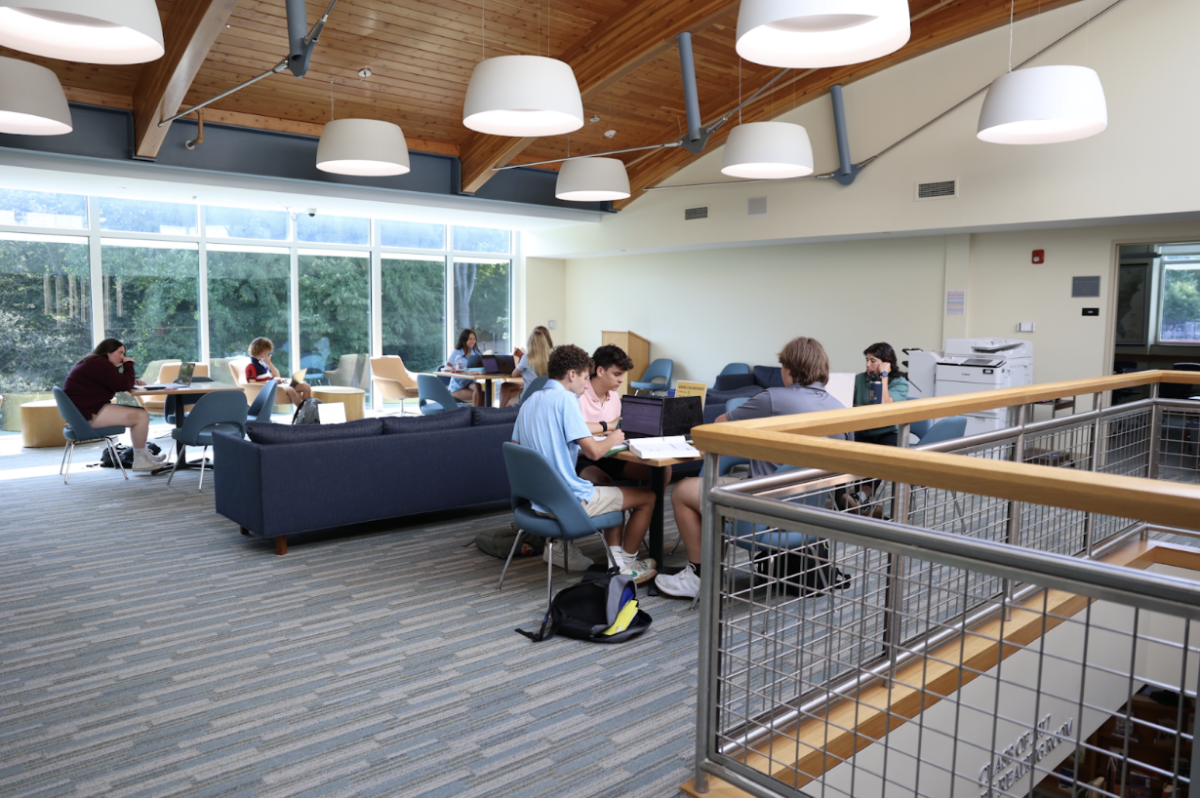 Upper School students studying in the upstairs library. 
